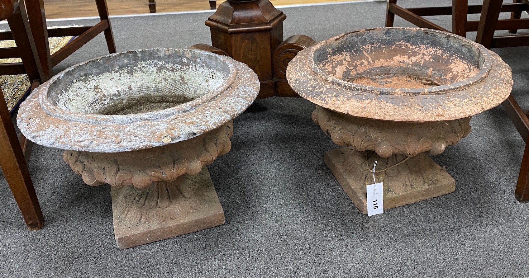 A pair of circular terracotta campana urns, diameter 44cm, height 29cm